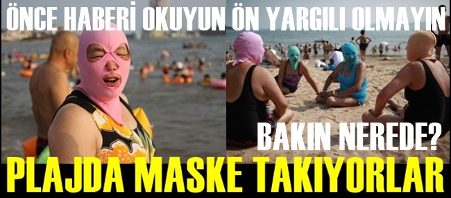 PLAJDA KAR MASKESİYLE GÜNEŞLENİYORLAR